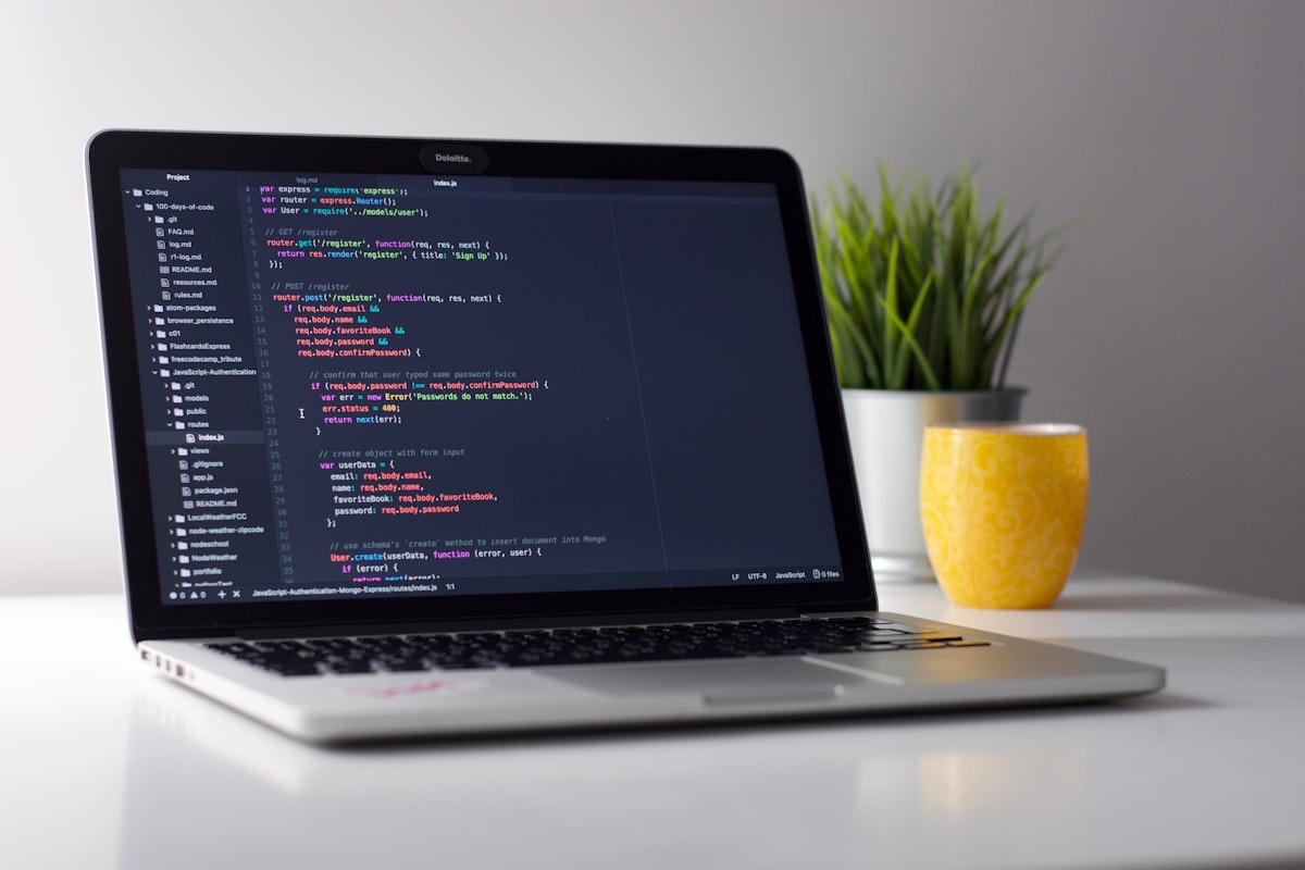 Engineer writing software at a workstation